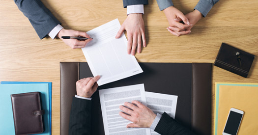 contracts being signed | The Tom Jackson Law Group